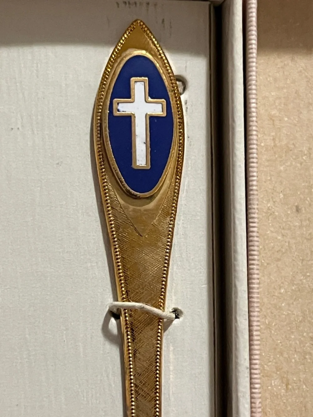 Vintage Gold Letter Opener with Blue and White Cross Emblem
